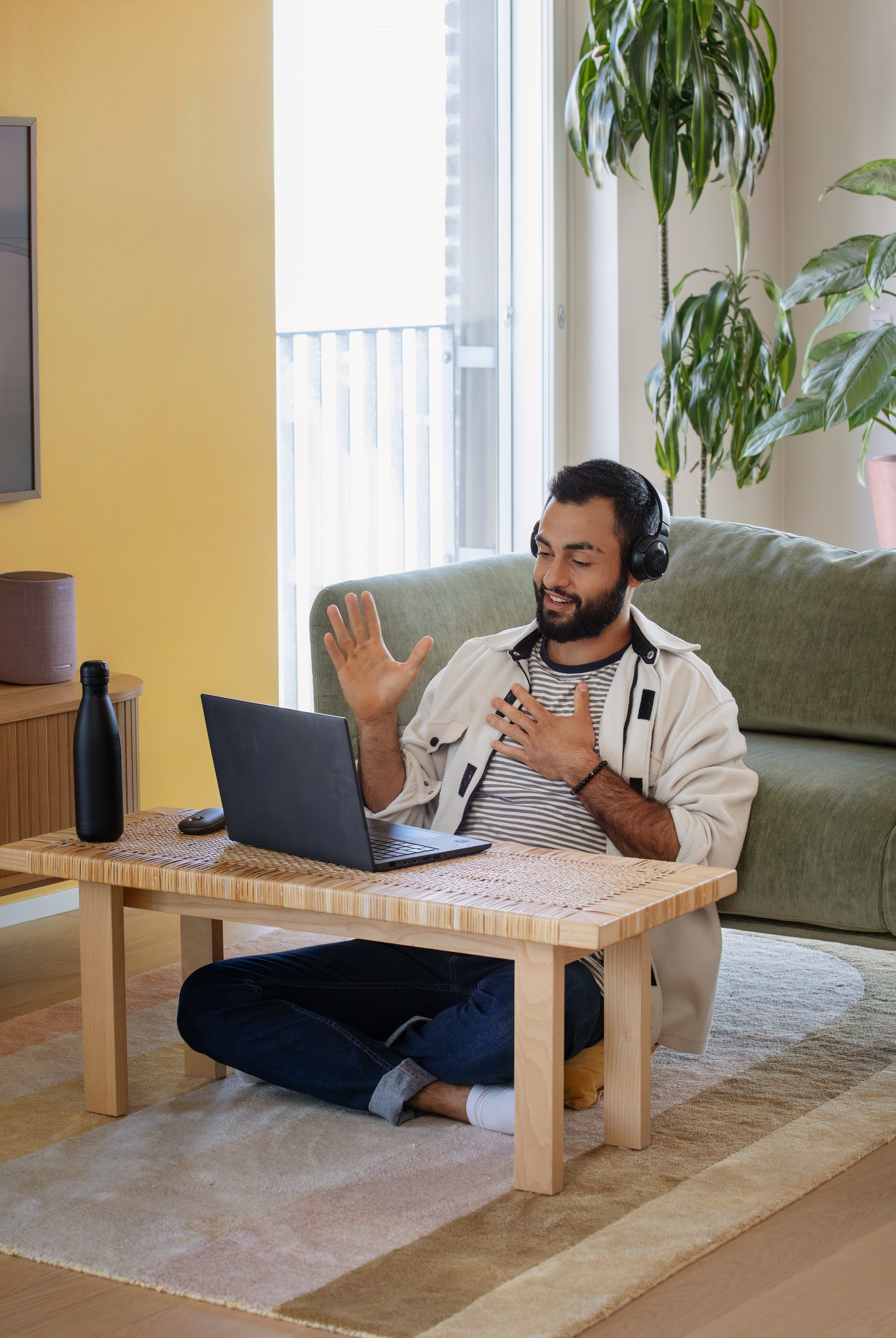 Man with headset working on a PC