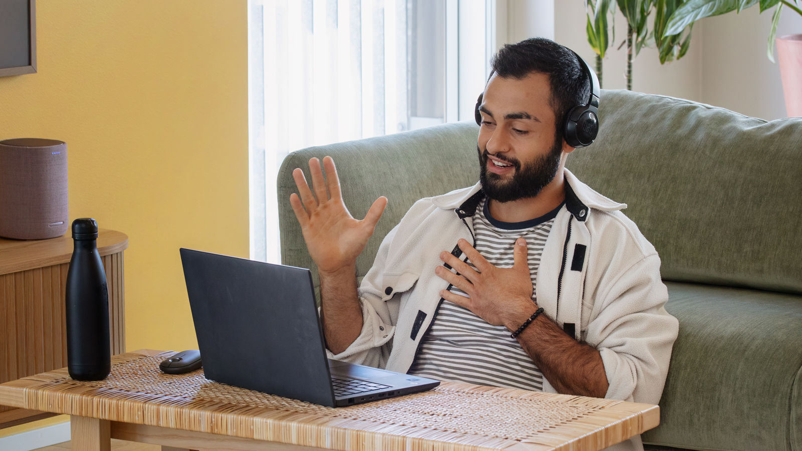 Man with headset working on a PC
