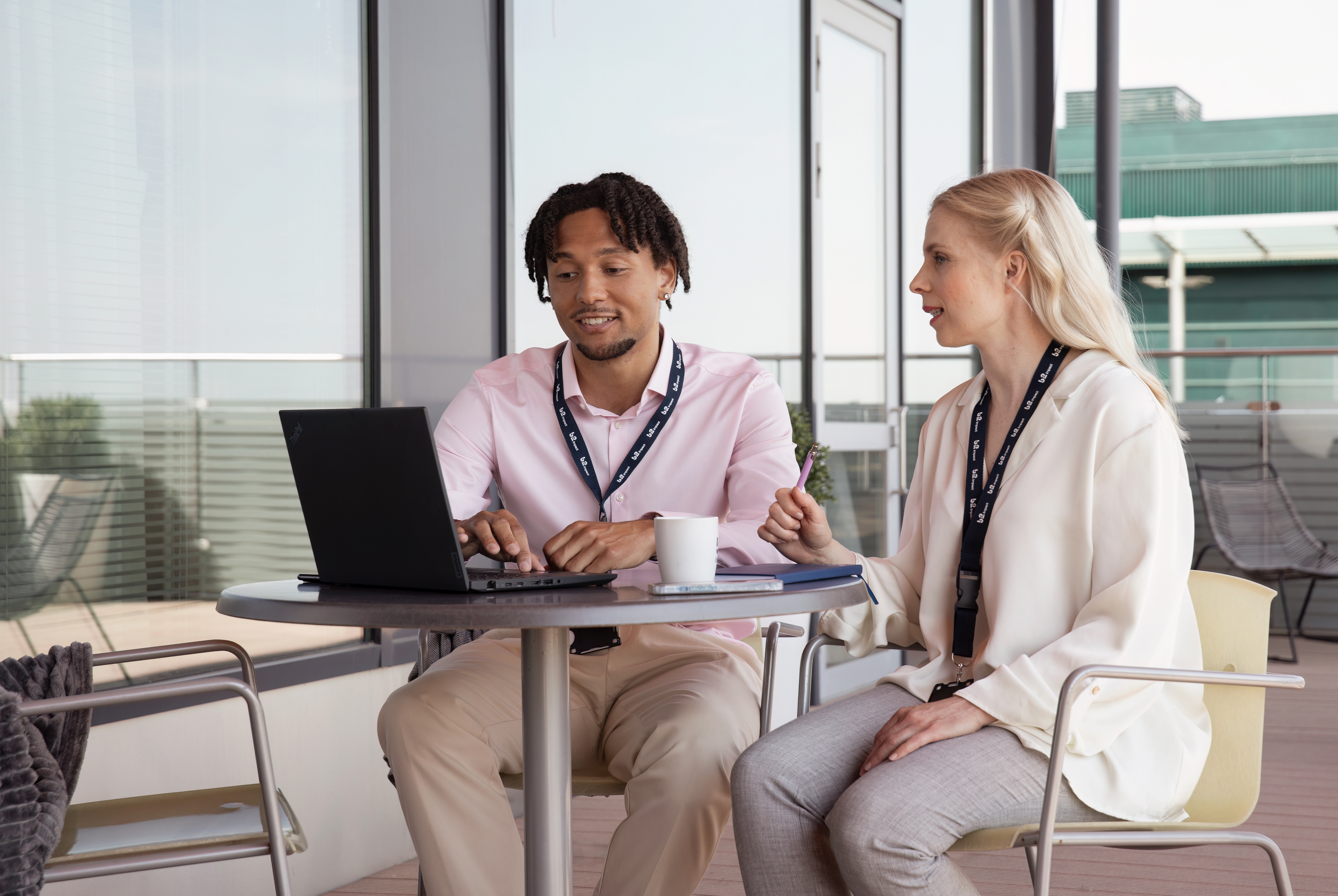 Man and woman in an office talking